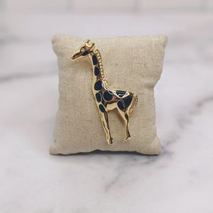 Gold plated & enamel giraffe brooch